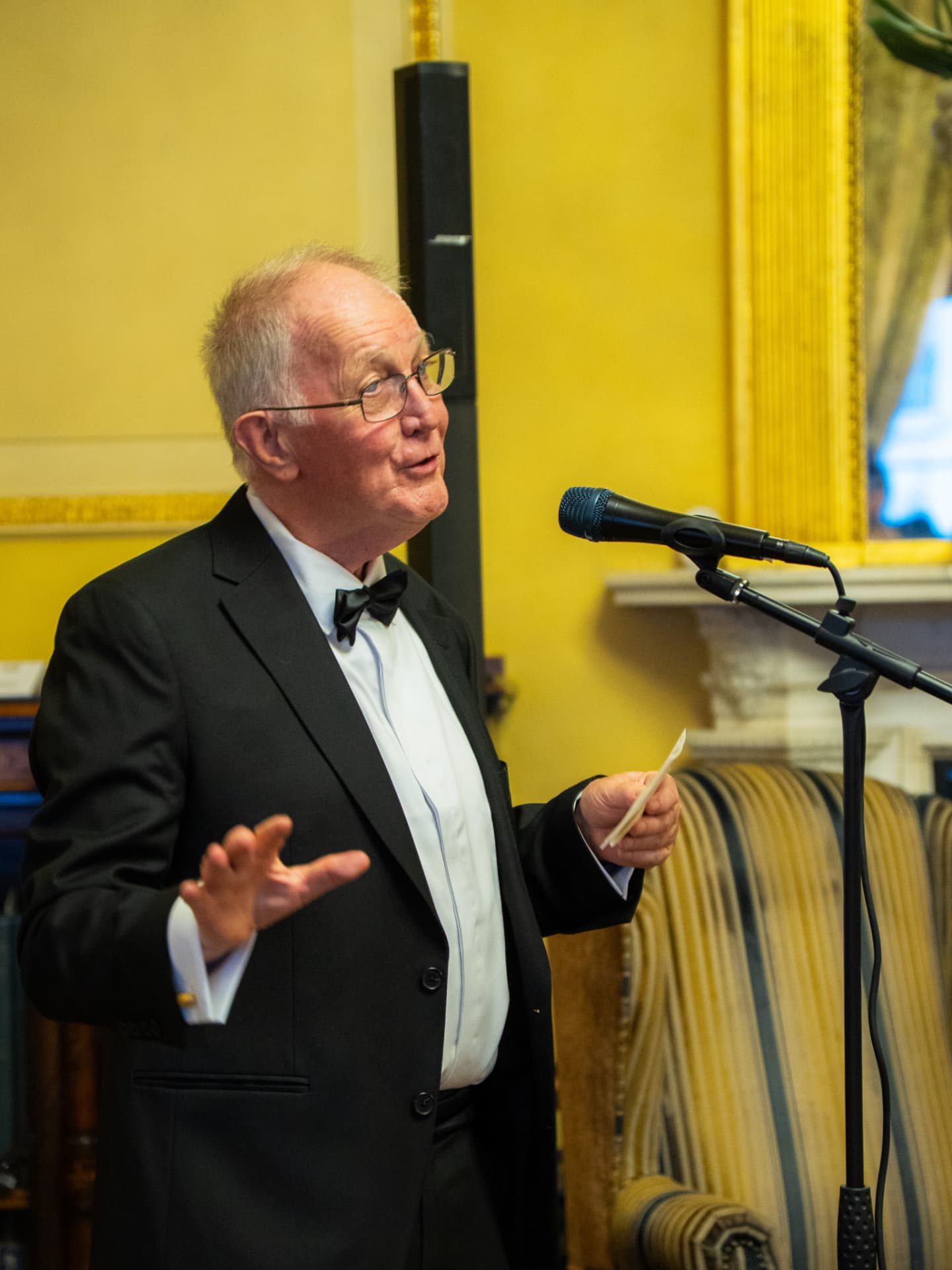 Speaker addressing guests at the HLH dinner